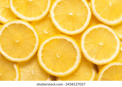 Yellow lemons sliced circle, top view close up. Background texture of fresh lemon slices, citrus fruits. - Powered by Shutterstock