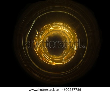 Yellow light. Abstract glowing orb with ring.Technology solar power source concept.Travel in the galaxy.Saturn planet
