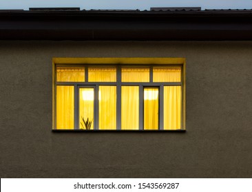 Yellow Light From Window Late At Night