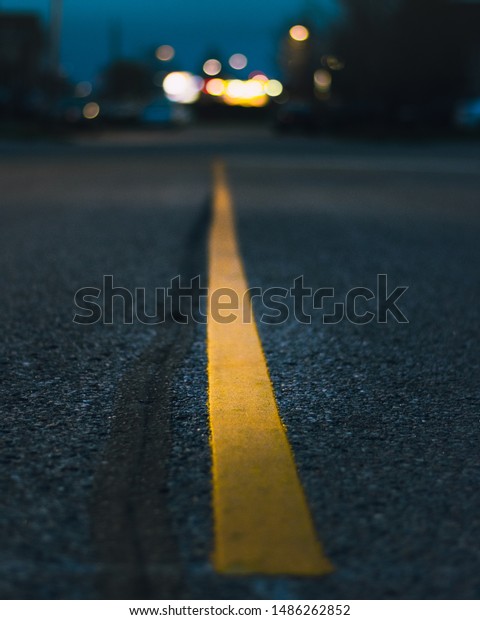 yellow line of the dark
road
