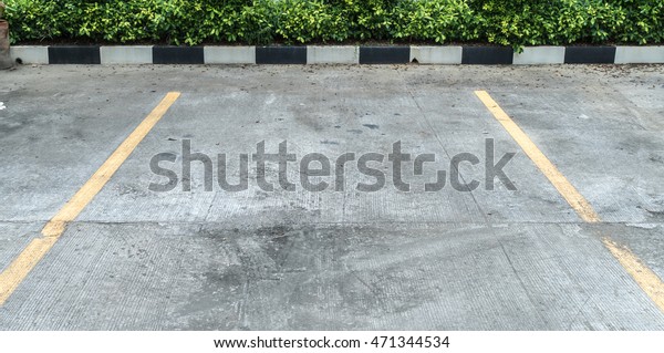 Yellow line on concrete car\
park