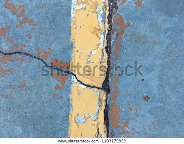 Yellow\
line paint on floor for texture and\
background