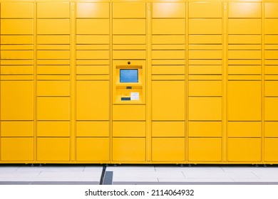 Yellow Locker With Screen And Scanner For Storage Of Packages Purchased Online. Messaging Concept, Compare Online, E-commerce And Packages