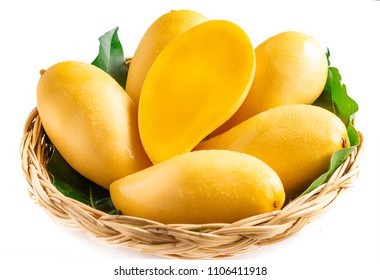 Yellow mango Beautiful skin In the basket In white background 