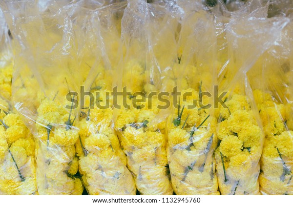 Download Yellow Marigold Flowers Plastic Bag Making Stock Photo Edit Now 1132945760 Yellowimages Mockups