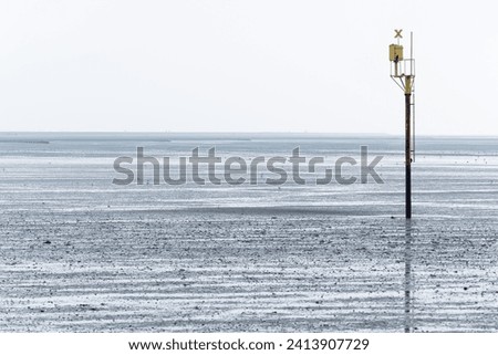 Similar – wooden platform with blue posts with ropes and orange lifebuoys on the background of the sea and sky with clouds Egypt Dahab South Sinai