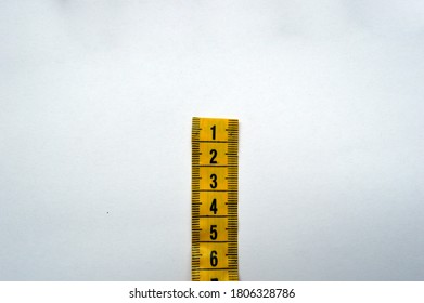 Yellow measure meter instrument tool length scale isolated. Ruler measurement tape centimeter equipment - Shutterstock ID 1806328786