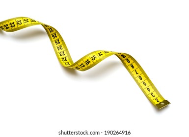 Yellow measuring tape isolated on white background - Shutterstock ID 190264916