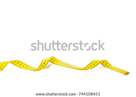 yellow metric measuring tape isolated on white panorama background