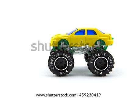 Yellow monster truck or monster car isolated on white