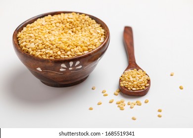 Yellow Moong Mung Dal Lentil Pulse Bean In Wooden And Spoon Bowl On White Background