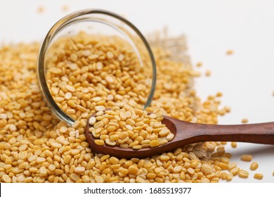 Yellow Moong Mung Dal Lentil Pulse Bean In Glass Bowl On White Background