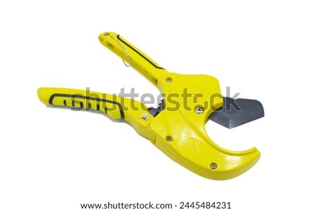 Yellow Multifunction Ratchet type PVC Tube and Plastic Pipe Cutter, Pipe Cutting, Plumbing Pipe, Wire and Trunking cutter scissors isolated on white background. Hand held Carpentry and plumbing tools.