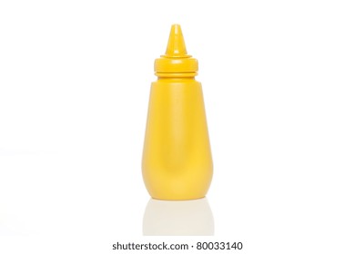 A Yellow Mustard Bottle Against A White Background