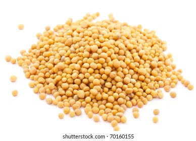 Yellow Mustard Seeds Isolated On White Background