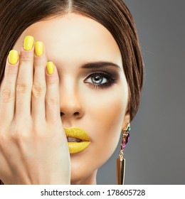 Yellow Nails And Lips. Beauty Woman Portrait