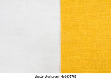 Yellow Napkin On White Wooden Table