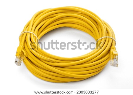 yellow network cable, isolated on white background. Closeup LAN cables with connector. Lan cable for internet network connection, gray lan cable on a white background. Ethernet network cable roll.