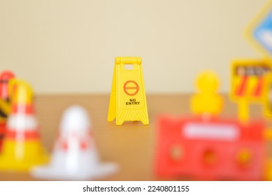 Yellow No Entry warning sign symbol with blurred background. - Shutterstock ID 2240801155