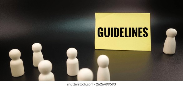 Yellow note with guidelines text beside single wooden doll facing multiple dolls – leadership, instruction, management, and team guidance concept in business. 