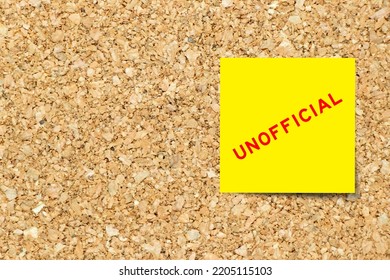 Yellow note paper with word unofficial on cork board background with copy space - Shutterstock ID 2205115103