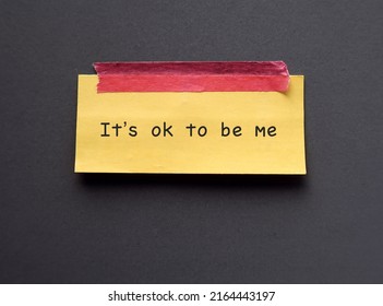 Yellow Note Stick On Blue Background With Text 'It’s Ok To Be Me' Concept Of Using Positive Sentences Mantra Affirmation Will Immediately Change The Way We Think And Boost Self Esteem