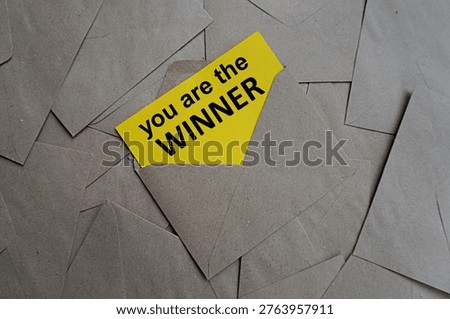 Yellow note you are the winner, self-development motivation, self-confidence achieve success, work hard to succeed