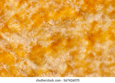 Yellow Orange Artificial Fur Textured Background