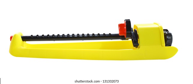 A Yellow Oscillating Lawn And Garden Sprinkler Isolated On White