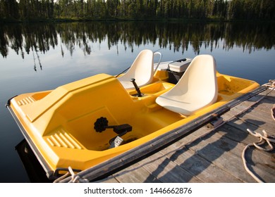 A Yellow Paddle Boat On The Water In A Lake In Ontario Canada