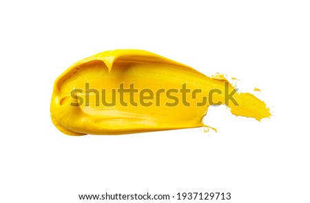 Yellow paint splatter isolated on white background.