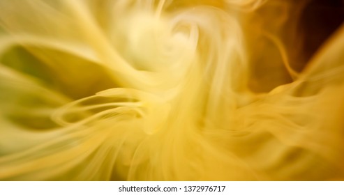 Yellow Paint 
Threads and Drops Mixing in Water. Ink swirling. Underwater 4K Macro Shot.