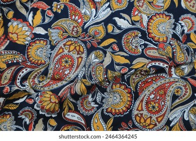 Yellow paisley pattern fabric background - Powered by Shutterstock