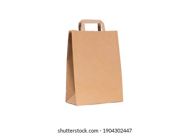 Yellow paper bag for shopping - Shutterstock ID 1904302447