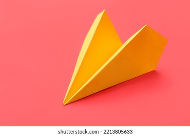 Yellow Paper Plane On Red Background