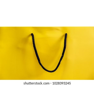 Yellow paper shopping bag isolated on white background with clipping path - Powered by Shutterstock