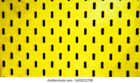 Yellow Peg Board Texture Pattern