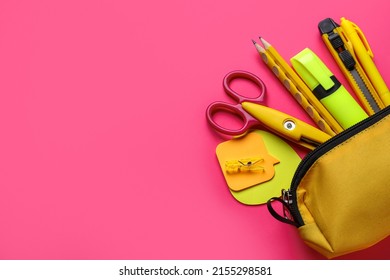 Yellow Pencil Case With Stationery Supplies On Pink Background