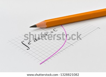 Yellow pencil and integrating the exponential function with its graph