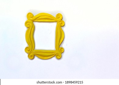 Yellow Photo Frame Or Mirror Frame With A White Background, To Frame Texts Or Images.