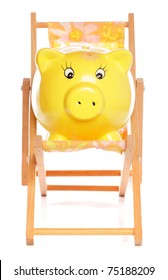 Yellow Piggybank On Deckchair Studio Cutout