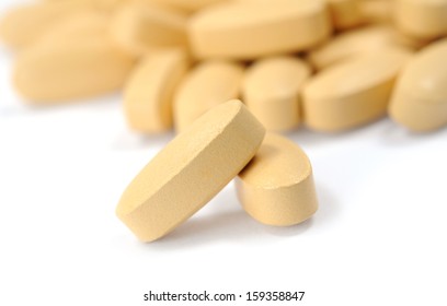 Yellow Pills On White 