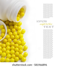 yellow pills in the pack closeup Isolated on white background