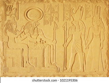 Yellow Plaster Bas-relief With The Gods Of Ancient Egypt, The Painting Of The Tomb Of Queen Nefertari, Goddess Hathor And The God RA-Horakhti