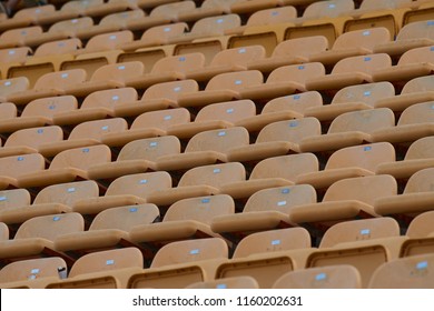 
yellow plastic seat of sports stadium - Shutterstock ID 1160202631