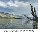 Yellow Pollen Dust Cloud at Pine Lake in the Yukon on a nice day in Summer