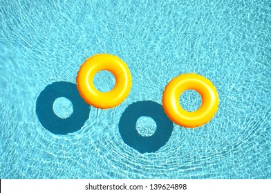 Yellow Pool Float, Pool Ring In Cool Blue Refreshing Blue Pool,