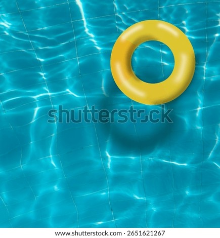 Yellow pool float, top view of yellow float in a refreshing blue swimming pool, ring float on a top of vibrant blue water surface.