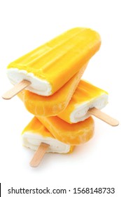 Yellow Popsicles In A Stack Isolated On White
