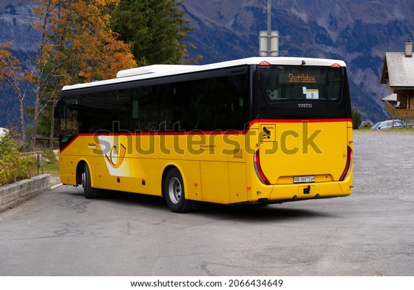 Yellow post shuttle bus from Brienz to Axalp\
for the air show event of the Swiss Air Force. Photo taken October\
19th, 2021, Brienz,\
Switzerland.